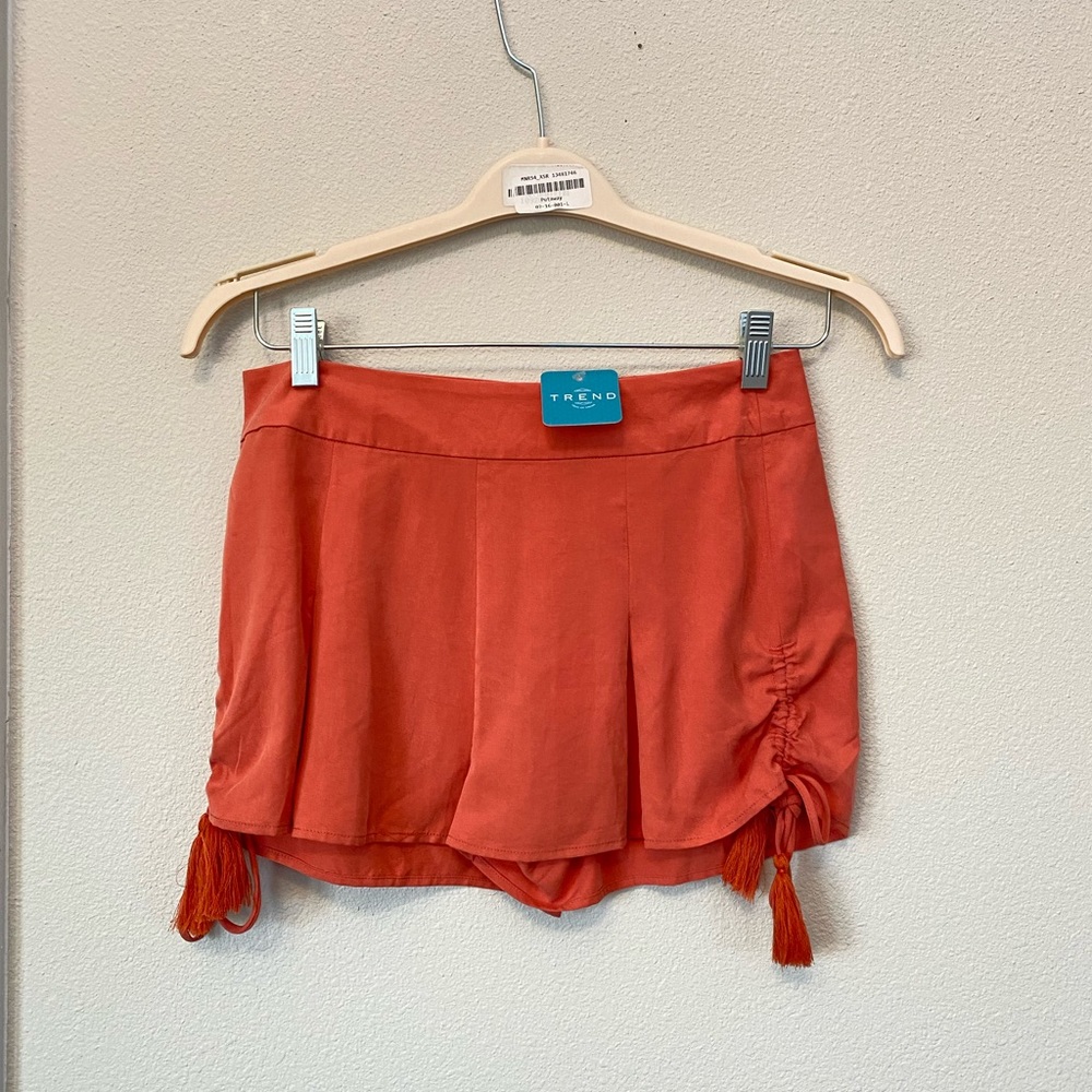 Orange shorts size Medium NWT